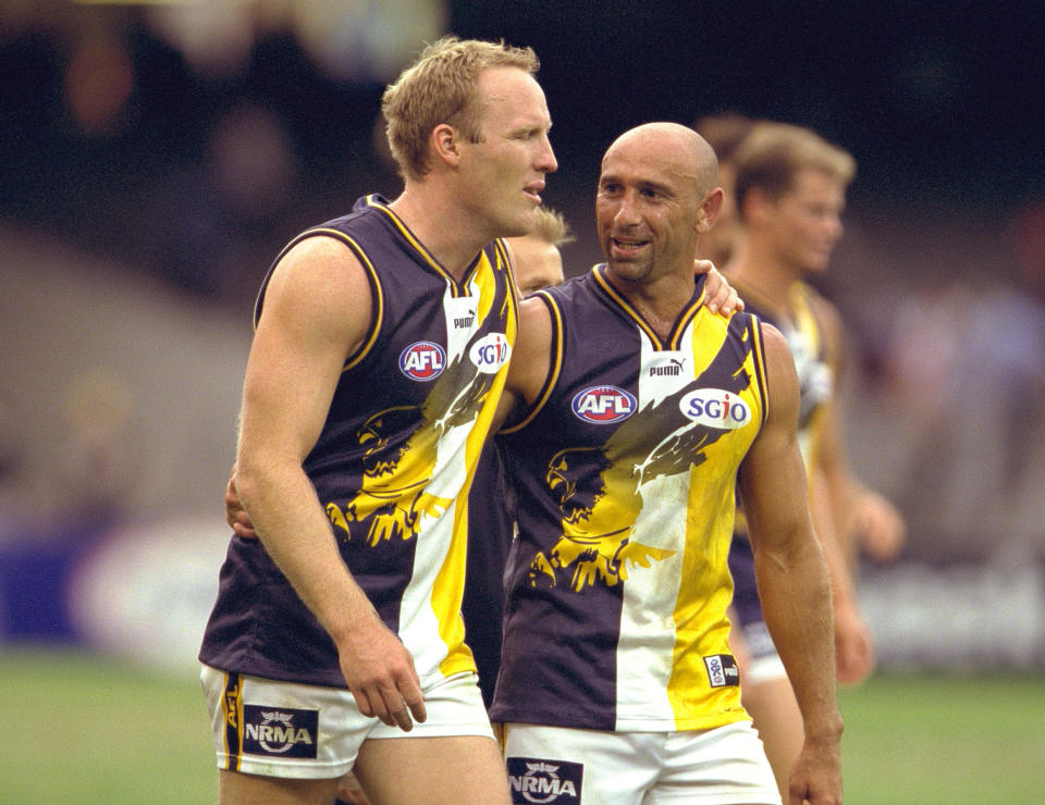 Peter Matera, pictured here with West Coast teammate Ashley McIntosh in 2001.