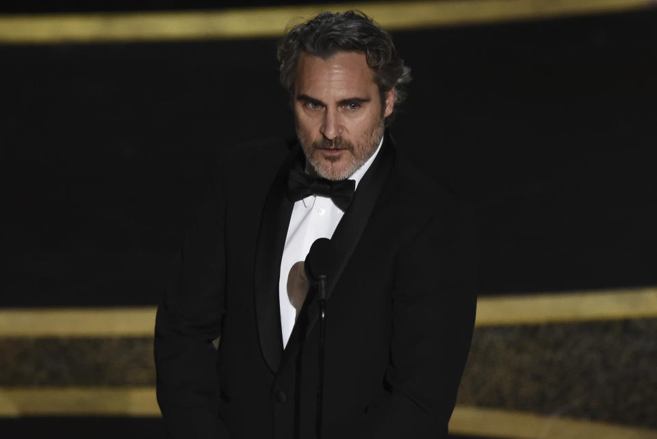 Joaquin Phoenix accepts the award for best performance by an actor in a leading role for "Joker" at the Oscars on Sunday, Feb. 9, 2020, at the Dolby Theatre in Los Angeles. (AP Photo/Chris Pizzello)