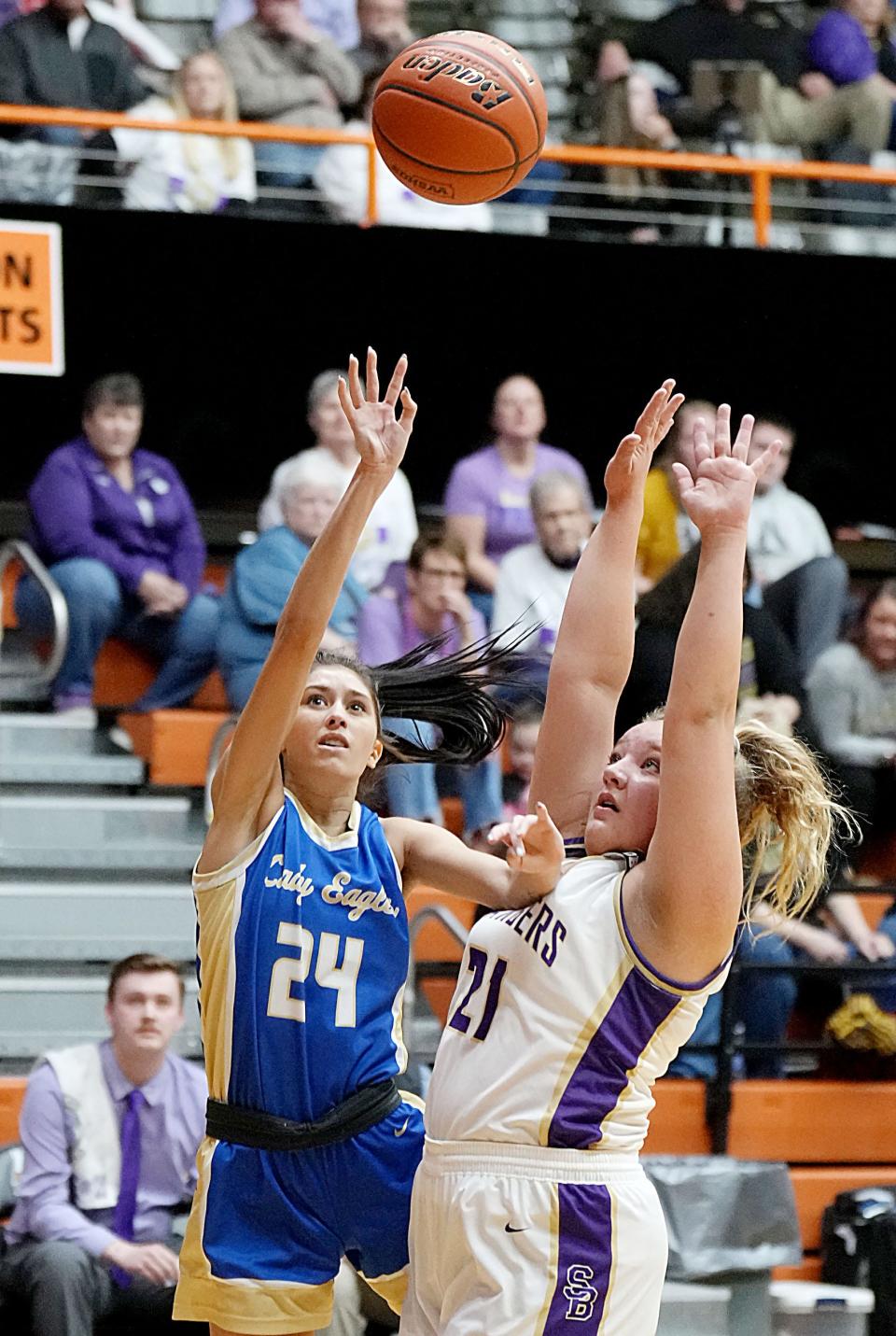 Wall's Lydia Hill (24) shoots over Sully Buttes' Loucasey Tines during their first-round game in the state Class B high school girls basketball tournament on Thursday, March 9, 2023 in the Huron Arena. Wall won 58-50.