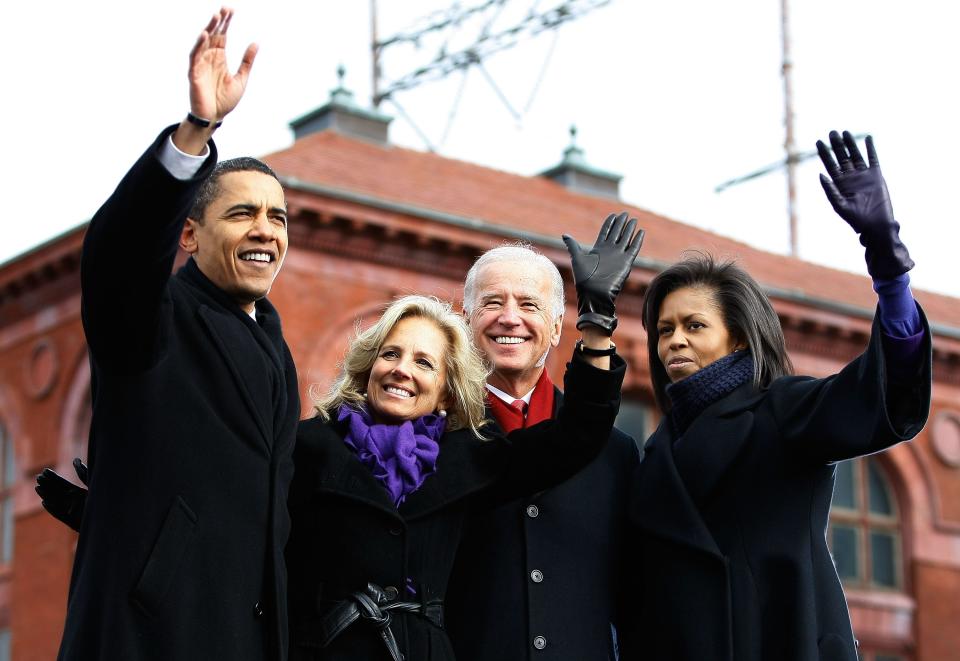 President-elect Barack Obama, Jill Biden, Vice President-elect Joe Biden and Michelle Obama wave to a crowd of supporters during a rally outside the train station on January 17, 2009 in Wilmington.