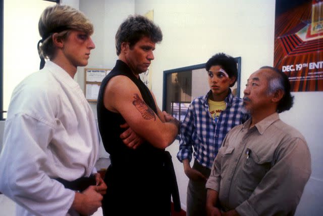 <p>Alamy</p> William Zabka, Martin Kove, Ralph Macchio and Pat Morita in 'The Karate Kid'