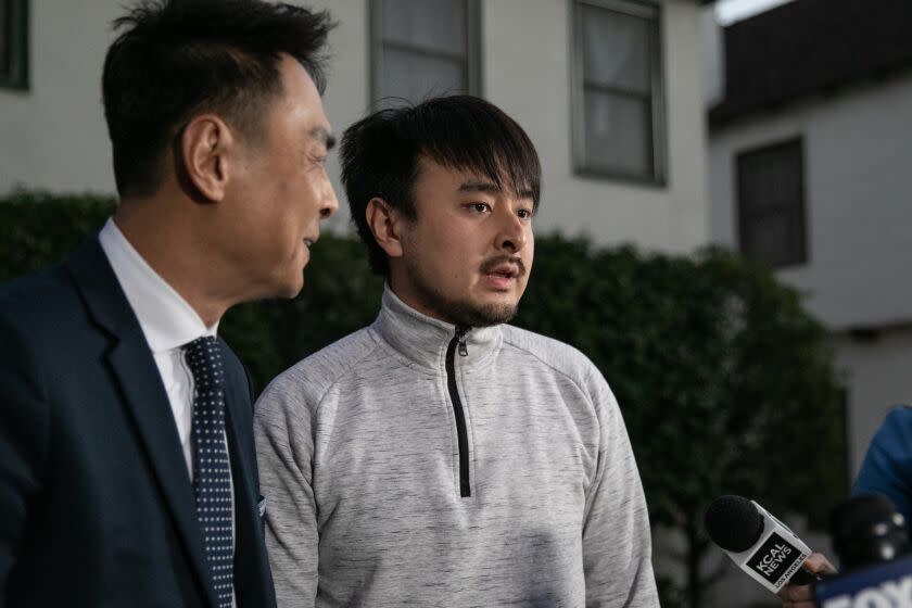 SAN MARINO, CA - JANUARY 23: Brandon Tsay, who disarmed the gunman who opened fire at a ballroom dance studio in Monterey Park along with his father Tom Tsay speaks with media on Monday, Jan. 23, 2023 in San Marino, CA. (Jason Armond / Los Angeles Times)