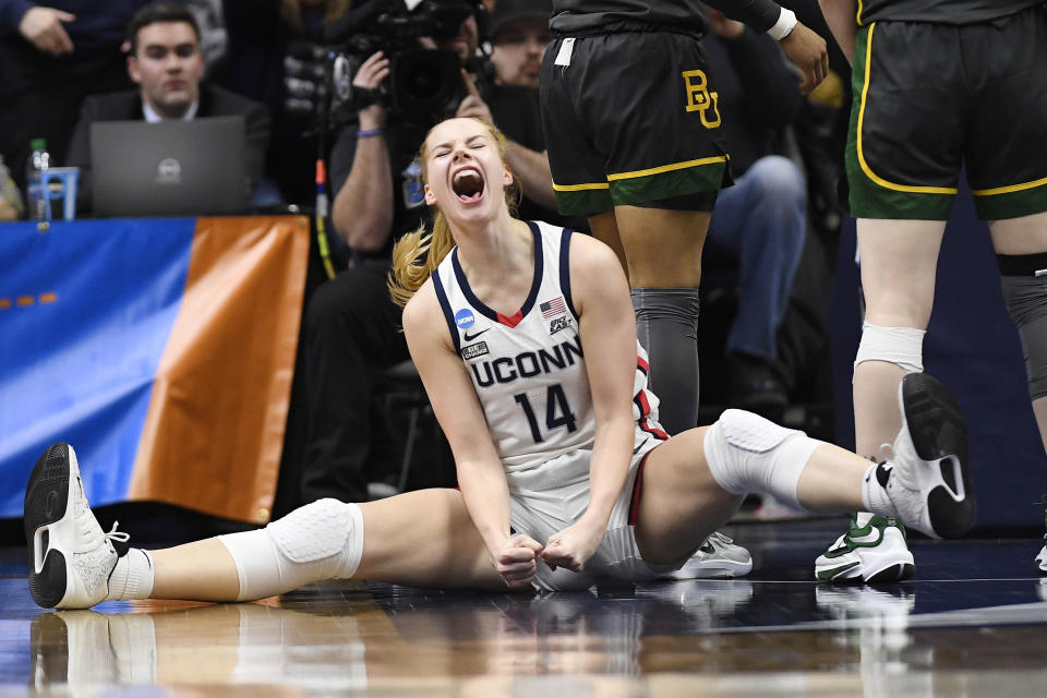 UConn's Dorka Juhasz (14) reacts in the second half of a second-round college basketball game after she was fouled while making a basket against Baylor in the NCAA Tournament in Storrs, Conn., March 20, 2023. March Madness may have been the last time for fans to see many of the talented college women players compete.Players' options for professional basketball careers are limited, whether in the U.S. or overseas — the jobs just aren't there. (AP Photo/Jessica Hill)