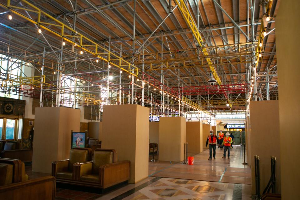 Scaffolding obscures work areas in the Union Station waiting room.