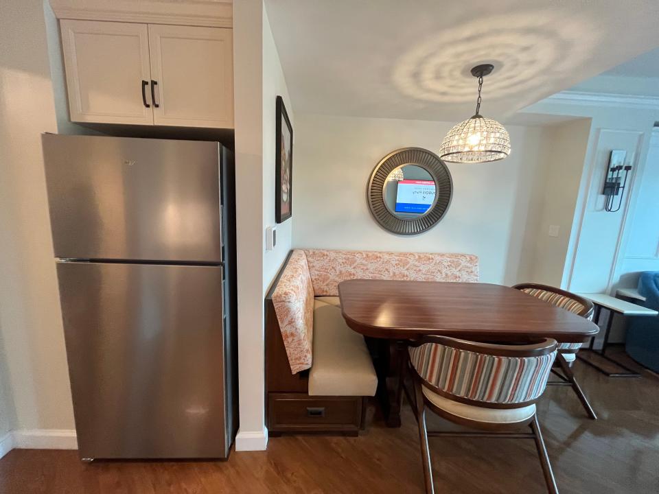 dining room and fridge in one bedroom villa at riviera resort in disney world