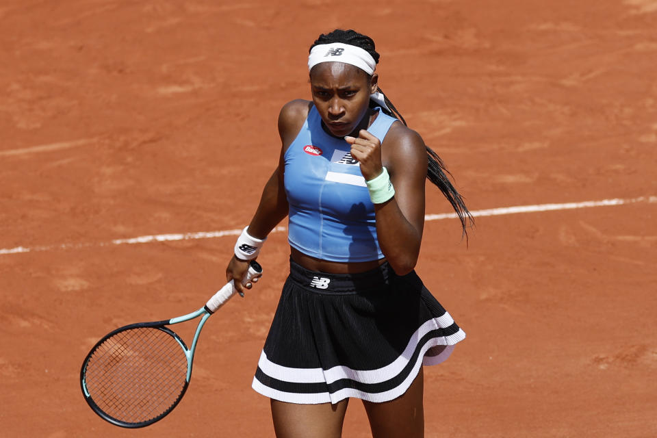 Coco Gauff of the U.S. clenches her fist after scoring a point against Spain's Rebeka Masarova during their first round match of the French Open tennis tournament at the Roland Garros stadium in Paris, Tuesday, May 30, 2023. (AP Photo/Jean-Francois Badias)