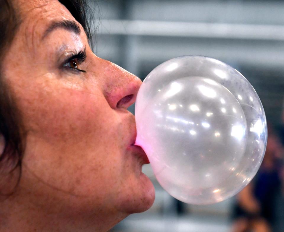 Carolyn Harris blows a double-bubble Tuesday. Harris has been coming to the West Texas Fair & Rodeo's Bubble Gum Contest since she was a girl.