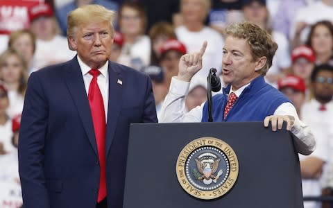 Donald Trump and Rand Paul - Credit: Luke Sharrett/Bloomberg