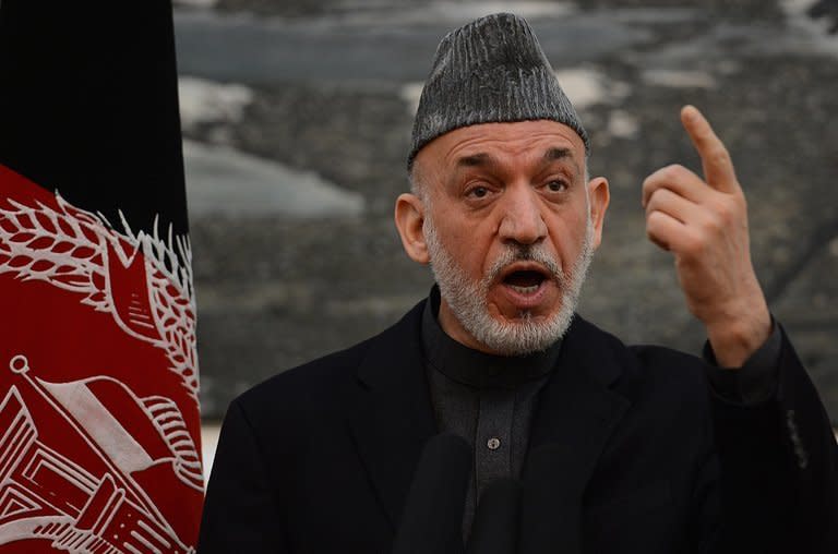 Afghan President Hamid Karzai is pictured at the Presidential Palace in Kabul on January 14, 2013. Karzai on Sunday gave US special forces two weeks to leave Wardak province, accusing Afghans they work with of torture and murder that has incited local "hatred"