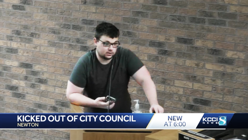 Noah Petersen speaking at a Newton City Council meeting.