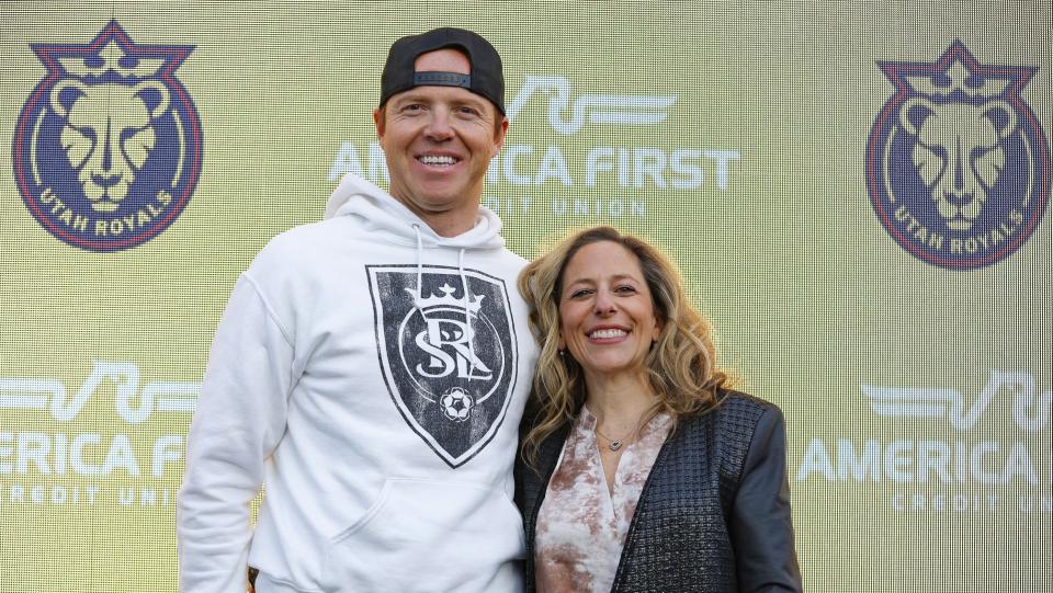 Real Salt Lake owner, Ryan Smith, left, and NWSL Commissioner Jessica Berman pose at a press conference where they announced the return of Utah Royals FC.