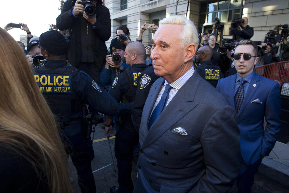Former campaign adviser for President Donald Trump, Roger Stone, leaves federal court Thursday, Feb. 21, 2019, in Washington. A judge has imposed a full gag order on Trump confidant Roger Stone after he posted a photo on Instagram of the judge with what appeared to be crosshairs of a gun. (AP Photo/Jose Luis Magana)