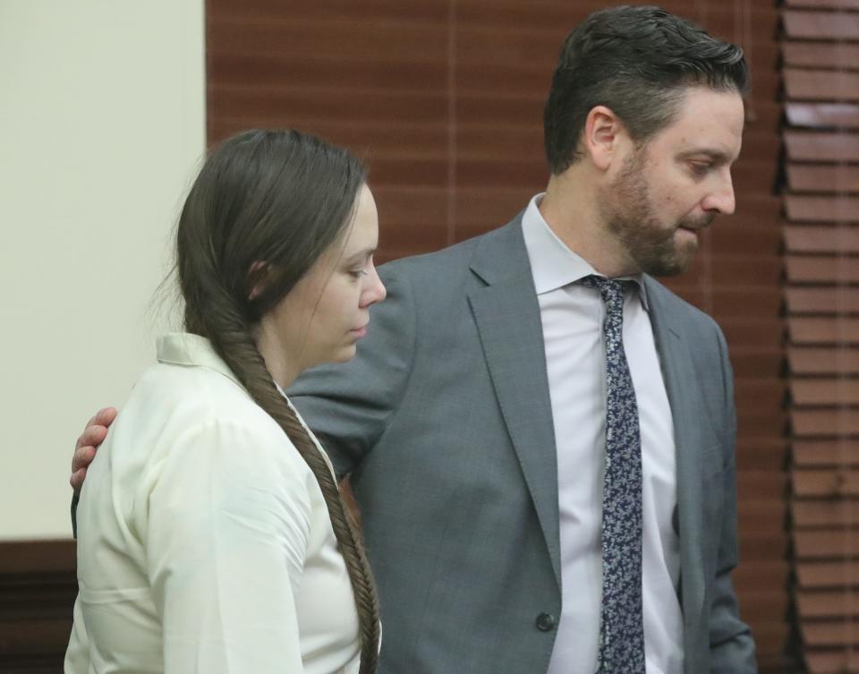 Erica Stefanko is accompanied by defense attorney Jeff laybourne Wednesday before a jury returned with a guilty verdict in her retrial for her involvement in Ashley Biggs' 20212 murder.