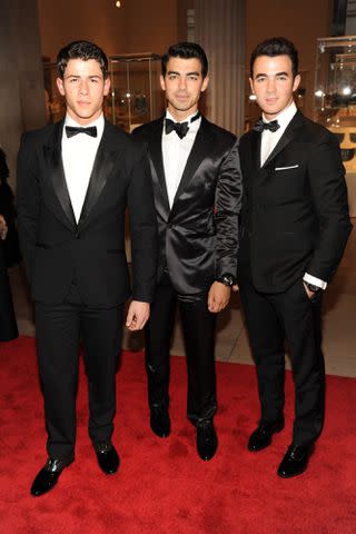 <p>Fairchild Archive/Penske Media via Getty</p> The Jonas Brothers at the 2012 Met Gala