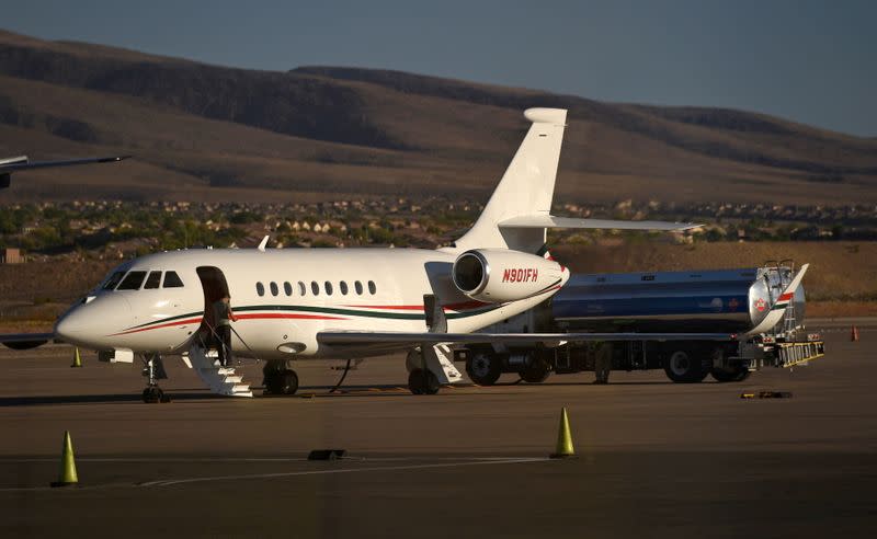 FILE PHOTO: A business jet is refuelled using Jet A fuel at the Henderson Executive Airport during the National Business Aviation Association (NBAA) exhibition in Las Vegas