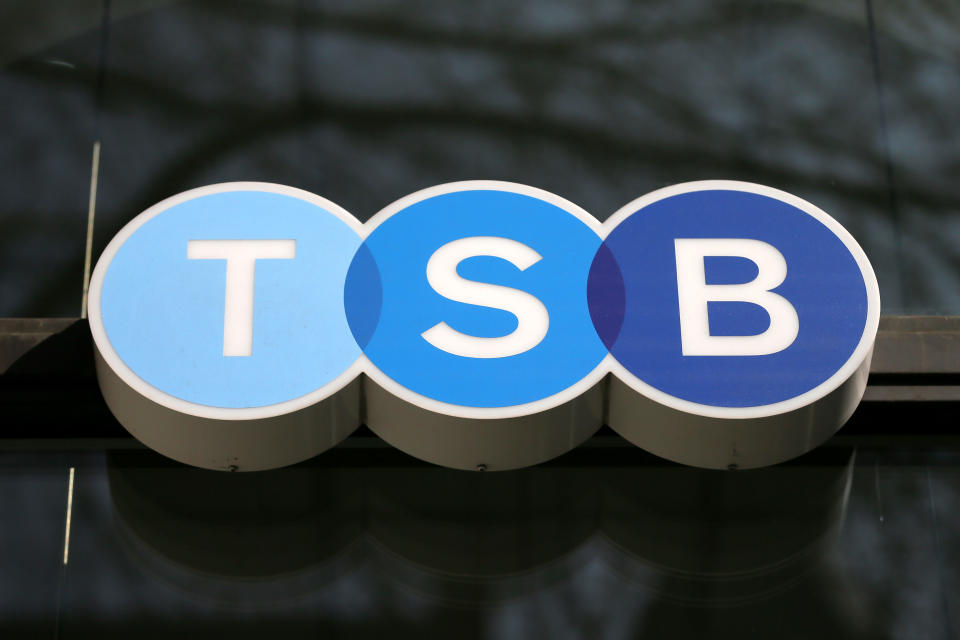 A general view of the sign outside a TSB branch in Holborn is seen as the bank accepted a 1.7 billion-pound ($2.6 billion) cash offer from Spain's Banco Sabadell, in London, Friday, March 20, 2015. Barcelona-based Sabadell said it was attracted by a UK banking market with "a well-defined and stable regulatory framework, consistent profitability and good future growth prospects.". (AP Photo/Tim Ireland)