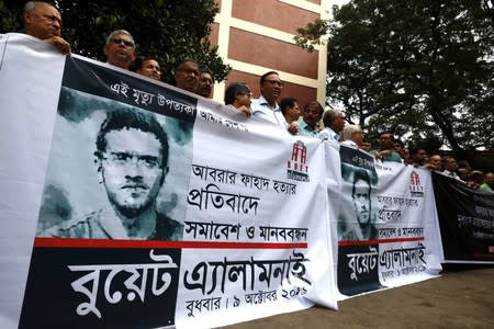 Teachers make a human chain to protest against the murder of Abrar Fahad, a student of Bangladesh University of Engineering and Technology (BUET) in Dhaka