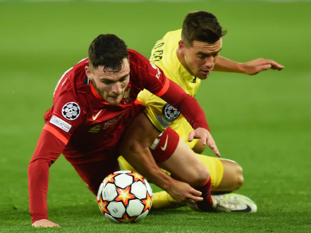 Andrew Robertson is brought down by Giovani Lo Celso (Liverpool FC via Getty Images)