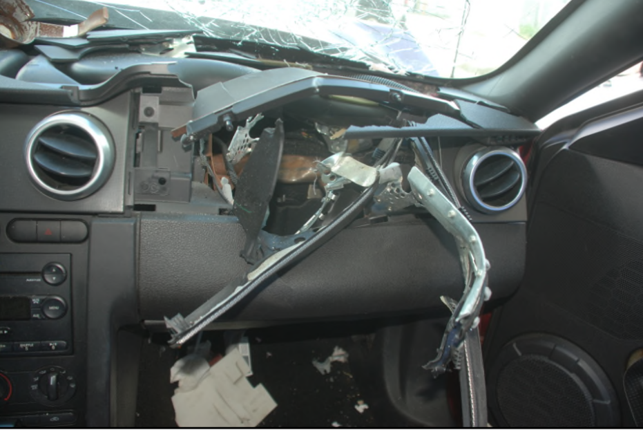 This is an image of the passenger air bag in a Ford Mustang that hadn't been repaired and later detonated, destroying the left eye and damaging the right eye of the passenger riding in 2020.