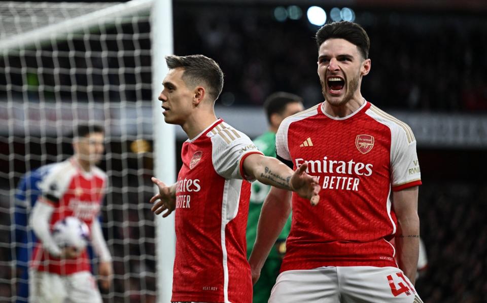 Arsenal's Leandro Trossard celebrates scoring their first goal with Declan Rice