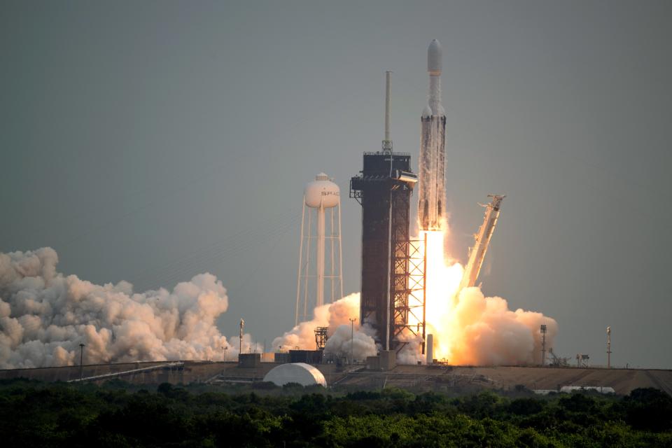 A SpaceX Falcon Heavy rocket with the Psyche spacecraft onboard is launched from Launch Complex 39A, on October 13, 2023, at the Kennedy Space Center in Cape Canaveral, Florida. <em>Photo by Aubrey Gemignani/NASA via Getty Images</em>