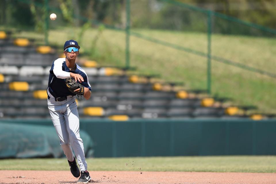 Trey Lawrence throws from third base during the Breakthrough Series camp June 9, 2022, at Jackie Robinson Training Complex in Vero Beach. The training camp was a diversity-focused event that served as a developmental opportunity for about 80 high school athletes from 16 states throughout the country who were selected by scouts, coaches and former MLB players recommended from their own programs. “The coaching staff we have assembled are the glue to what we are doing here,” Senior Coordinator for Major League Baseball Kindu Jones said. “They are the ones preaching the gospel on the field to the players and without them this doesn’t run to the level that it is right now.” 