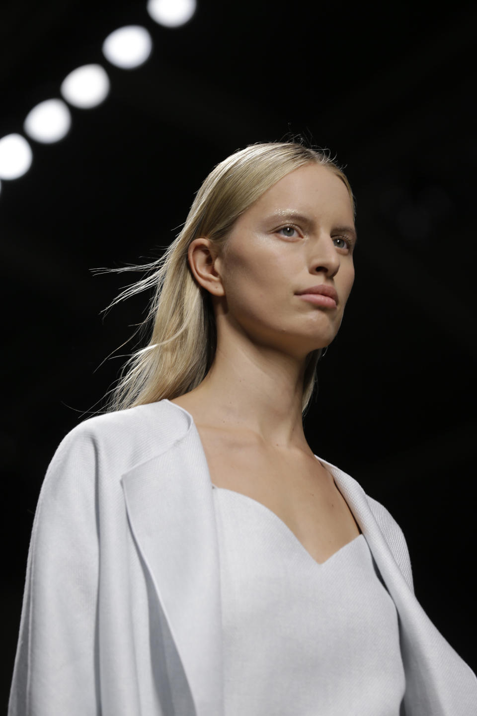 Czech Republic model Karolina Kurkova wears a creation for Max Mara women's Spring-Summer 2014 collection, part of the Milan Fashion Week, unveiled in Milan, Italy, Thursday, Sept. 19, 2013. (AP Photo/Luca Bruno)