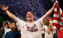 <p>Scott Webb, of Waldorf, Md., celebrates during the finale of the Boston Pops Fourth of July Concert at the Hatch Shell in Boston, Mass., Thursday, July 4, 2013. (Photo: Michael Dwyer/AP) </p>