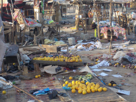 Fruits and scattered stalls are seen at the Muna Garage after two male suicide bombers detonated the bombs in Maiduguri, Nigeria January 17, 2018. REUTERS/Stringer