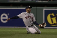 Houston Astros center fielder Jose Siri catches a fly ball hit by Boston Red Sox's Alex Verdugo during the sixth inning in Game 3 of baseball's American League Championship Series Monday, Oct. 18, 2021, in Boston. (AP Photo/Winslow Townson)