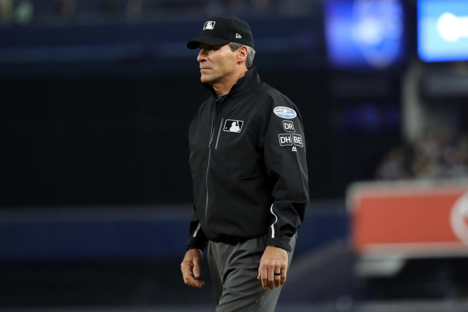 First-base umpire Angel Hernandez looks on during Game 3 of the ALDS between the Boston Red Sox and the New York Yankees at Yankee Stadium on Monday. (Getty Images)