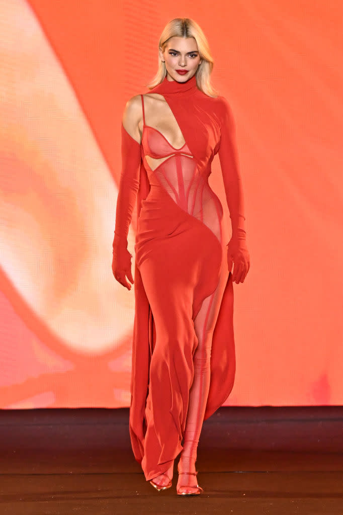 blonde hair Kendall Jenner on L'Oréal Paris' Walk Your Worth Runway on Sept. 23 in Paris, fashion week, Mugler, red, sheer trend