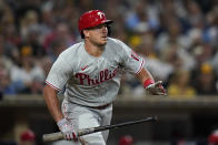 Philadelphia Phillies' J.T. Realmuto watches his three-run home run during the sixth inning of the team's baseball game against the San Diego Padres, Thursday, June 23, 2022, in San Diego. (AP Photo/Gregory Bull)