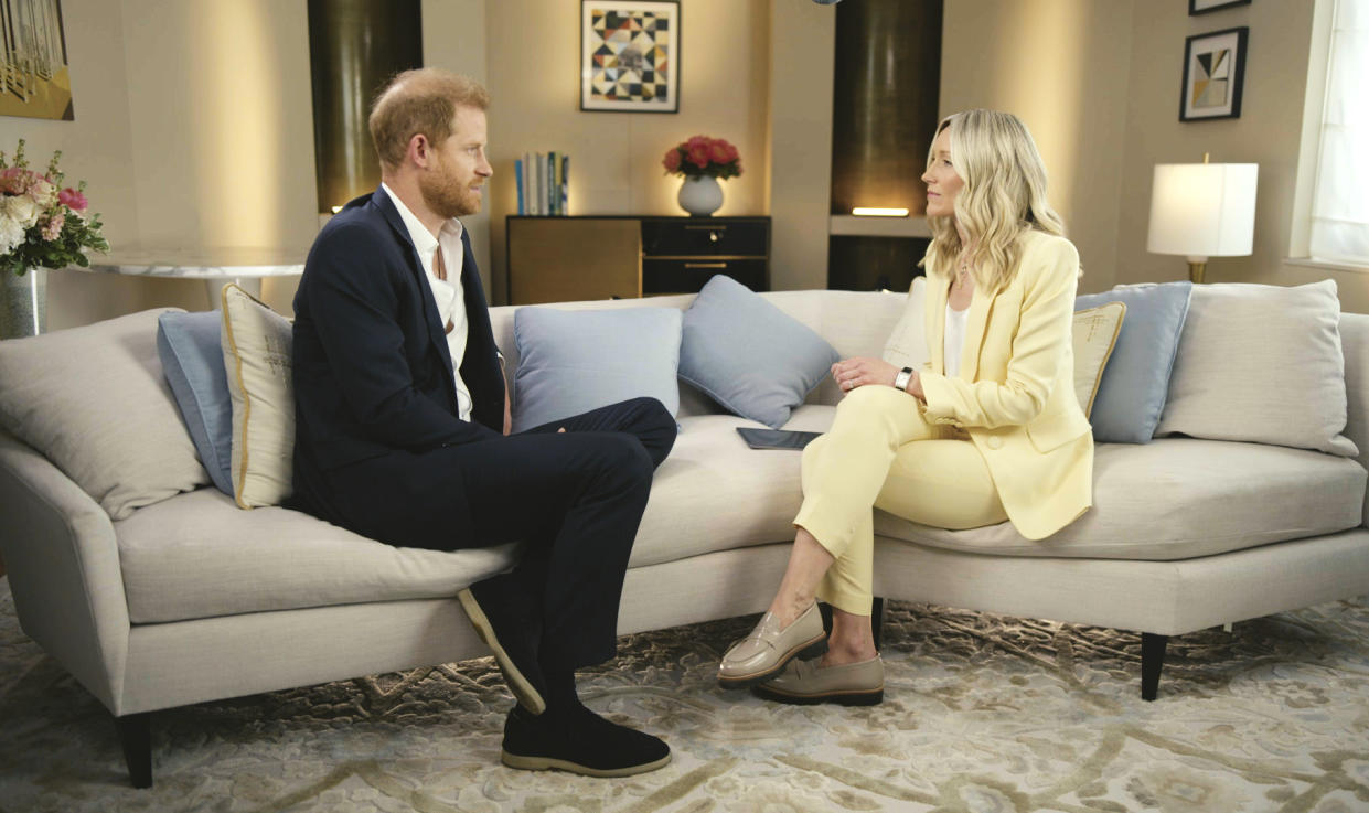 The Duke of Sussex sat on a sofa being interviewed by ITV News' Rebecca Barry 