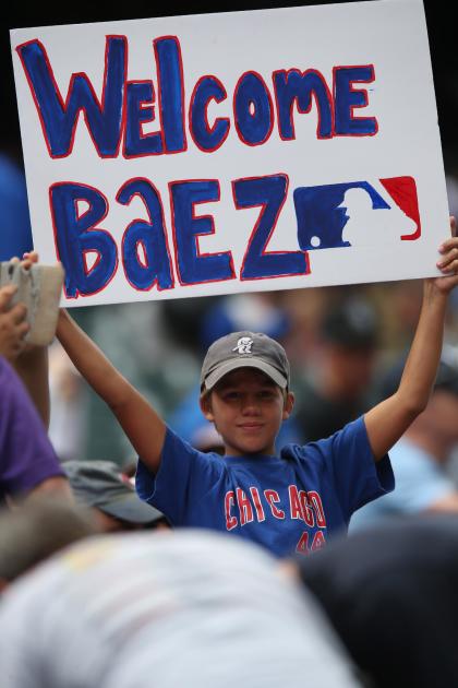 Even Cubs fans in Denver love Javier Baez. (AP)