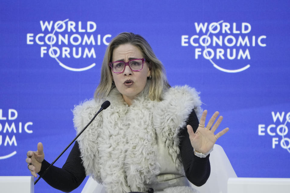 CORRECTS POLITICAL PARTY AFFILIATION TO INDEPENDENT - Sen. Kyrsten Sinema, I-Ariz, speaks on a panel at the World Economic Forum in Davos, Switzerland Tuesday, Jan. 17, 2023. The annual meeting of the World Economic Forum is taking place in Davos from Jan. 16 until Jan. 20, 2023. (AP Photo/Markus Schreiber)