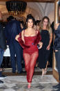 <p>is serving va-va-voom in this vibrant red Dolce & Gabbana gown featuring a bustier bodice and sheer overlay, styled with matching strappy shoes, a stole and bombshell hair and makeup for the <span>couple's welcome dinner at </span><span>Ristorante Puny</span>. </p>