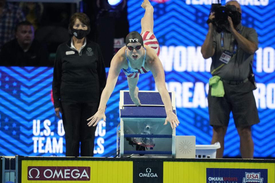 Lilly King participates in the women's 100 breaststroke during wave 2 of the U.S. Olympic Swim Trials on Tuesday, June 15, 2021, in Omaha, Neb. (AP Photo/Charlie Neibergall)