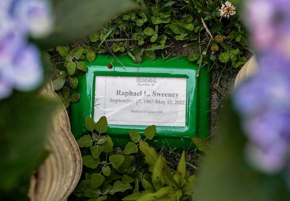 A temporary marker at the gravesite of Rafe Sweeney at St. Columba Cemetery in Middletown.