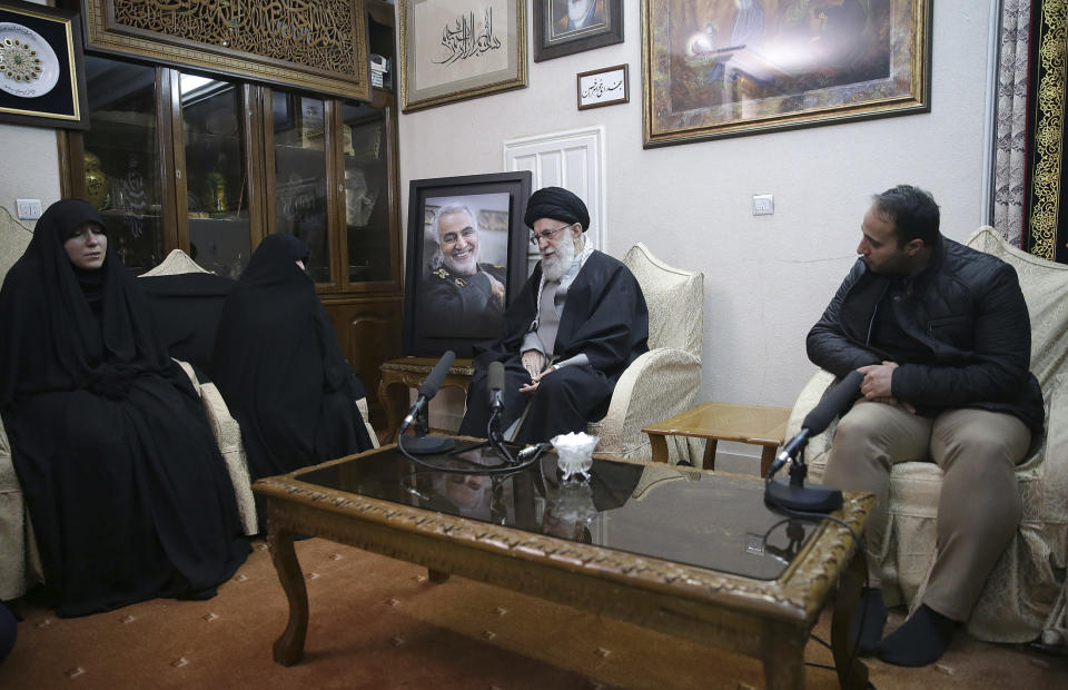 In this picture released by the official website of the office of the Iranian supreme leader, Supreme Leader Ayatollah Ali Khamenei, center, meets family of Iranian Revolutionary Guard Gen. Qassem Soleimani, who was killed in the U.S. airstrike in Iraq, at his home in Tehran, Iran, Friday, Jan. 3, 2020. (Office of the Iranian Supreme Leader via AP)