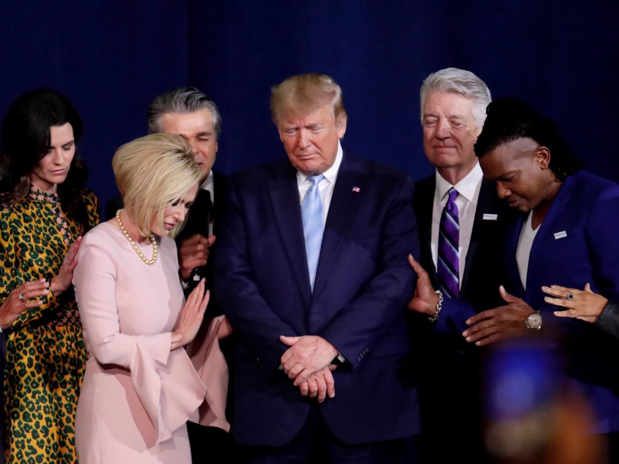 Trump appointed televangelist Paula White [2nd from left] as a faith adviser in the White House: AP