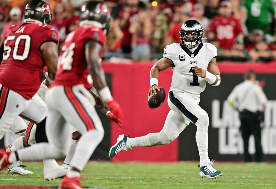 TAMPA, FLORIDA – SEPTEMBER 25: Jalen Hurts #1 of the Philadelphia Eagles scrambles during the second quarter against the Tampa Bay Buccaneers at Raymond James Stadium on September 25, 2023 in Tampa, Florida. (Photo by Julio Aguilar/Getty Images)