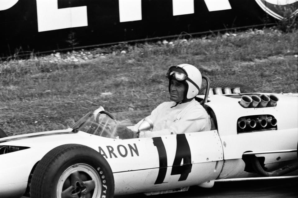 Actor James Garner stars as american Grand Prix driver Pete Aron, who is fired by his Jordan-BRM racing team & begins to drive for the Japanese Yamura team. Pictured: During filming, James Garner had to drive his racing car (no stunt man) for 1/2 a mile round Brands Hatch circuit while on fire. Stopping just after the finishing line, James leapt from the cockpit just as flames engulfed the car. Firemen where on standby to put out the flames. James Garner is insured for £1million during the making of this film. (Photo by Daily Mirror/Mirrorpix/Mirrorpix via Getty Images)