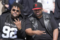 Slum Village members Young RJ, left, and T3, pose before being honored by the Michigan Central Station, Thursday, June 6, 2024, in Detroit. (AP Photo/Carlos Osorio)