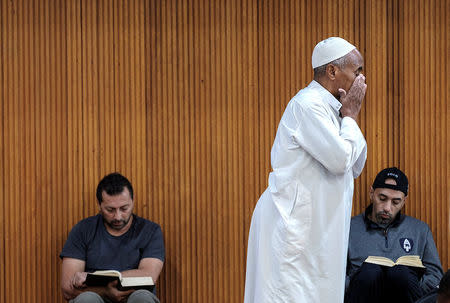 A Muslim prays at the Elsedeaq Heidelberg Mosque, located in the Melbourne suburb of Heidelberg in Australia, March 2, 2018. Picture taken March 2, 2018. REUTERS/Luis Enrique Ascui