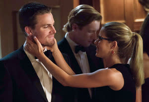 Stephen Amell, Emily Bett Rickards | Photo Credits: Jack Rowand/The CW