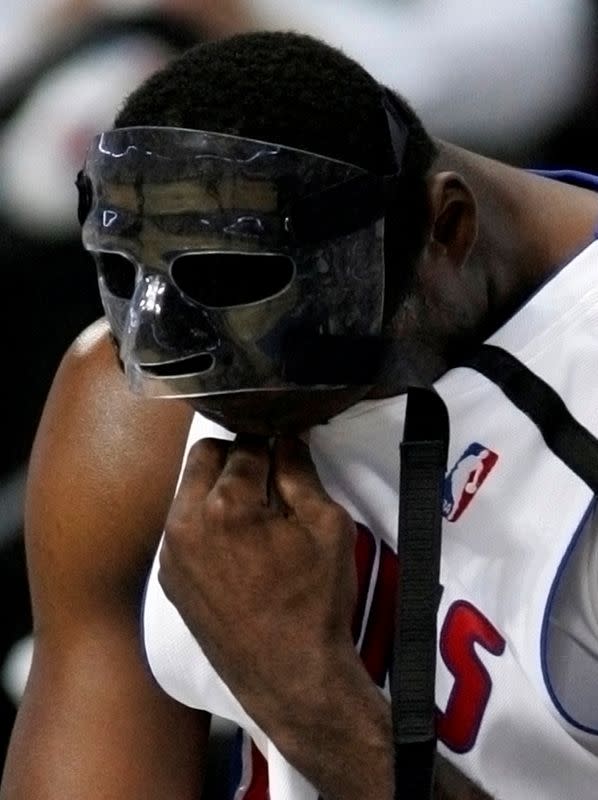 FILE PHOTO: Detroit Pistons' Antonio McDyess sits on the sideline during the second quarter of their 94-80 defeat by the Boston Celtics in Game 3 of the NBA Eastern Conference Finals.