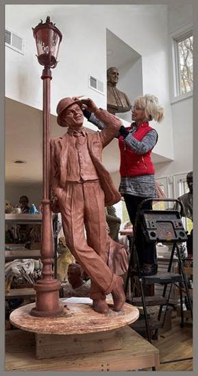 Sculptor Carolyn Palmer completes clay model of Frank Sinatra statue which was then cast in bronze.