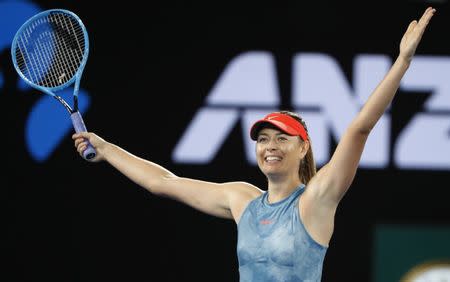 Tennis - Australian Open - Third Round - Melbourne Park, Melbourne, Australia, January 18, 2019. Russia's Maria Sharapova celebrates after winning the match against Denmark's Caroline Wozniacki. REUTERS/Aly Song