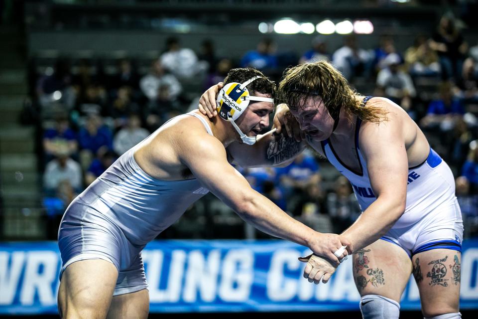 Central Oklahoma's Shawn Streck, left, wrestles Glenville State College's Jared Campbell at 285 pounds in the finals during the NCAA Division II Wrestling Championships, Saturday, March 11, 2023, at Alliant Energy PowerHouse in Cedar Rapids, Iowa.